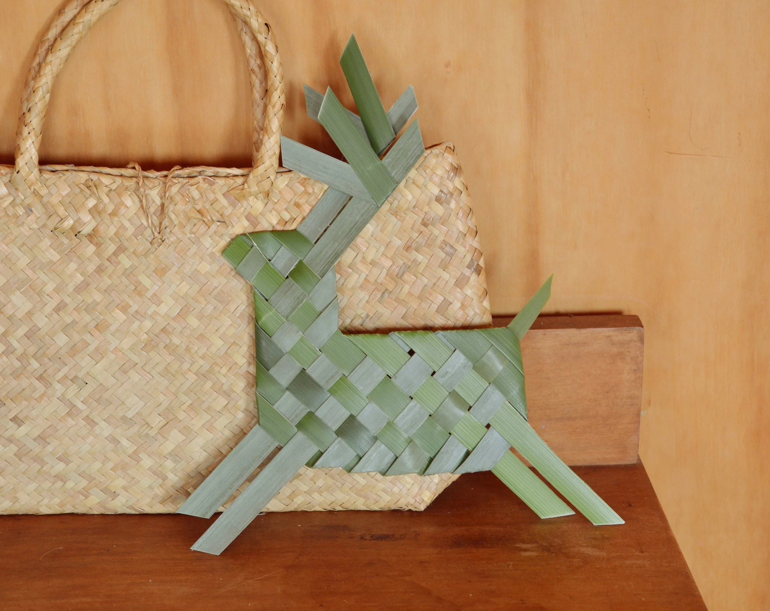 A reindeer woven from flax strips