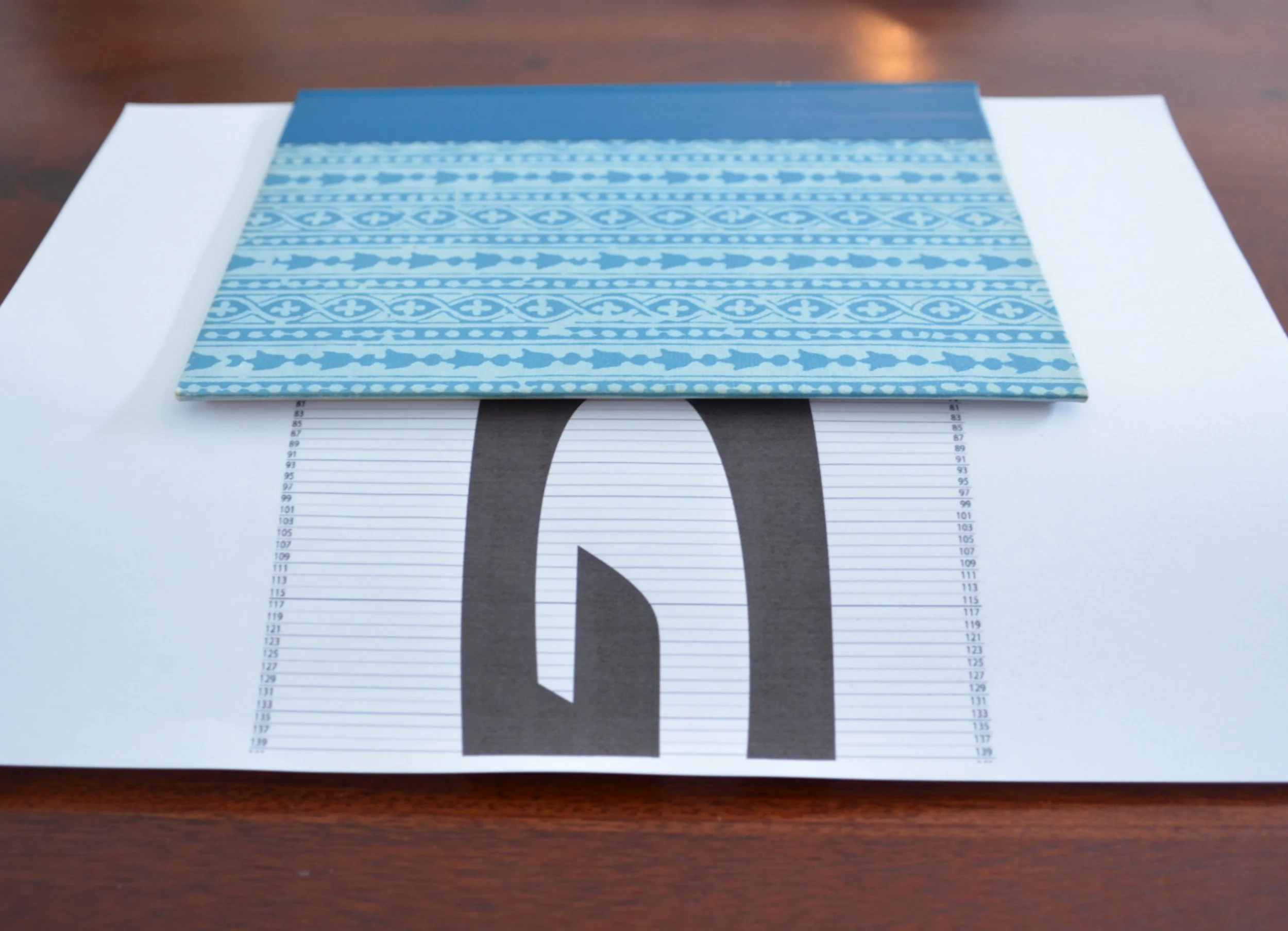 Drawing reference lines on the template with a ruler and pencil