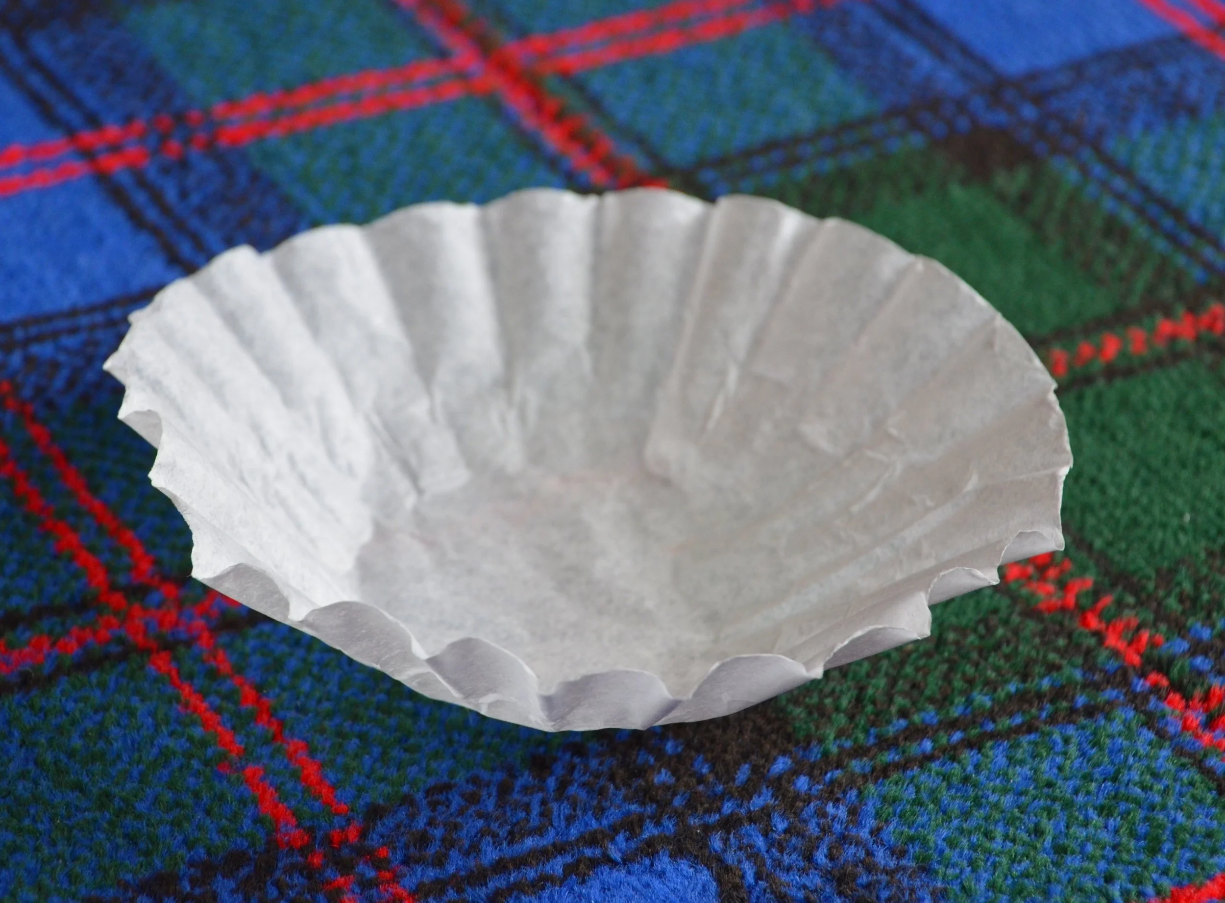 A large flower made from layered coffee filters